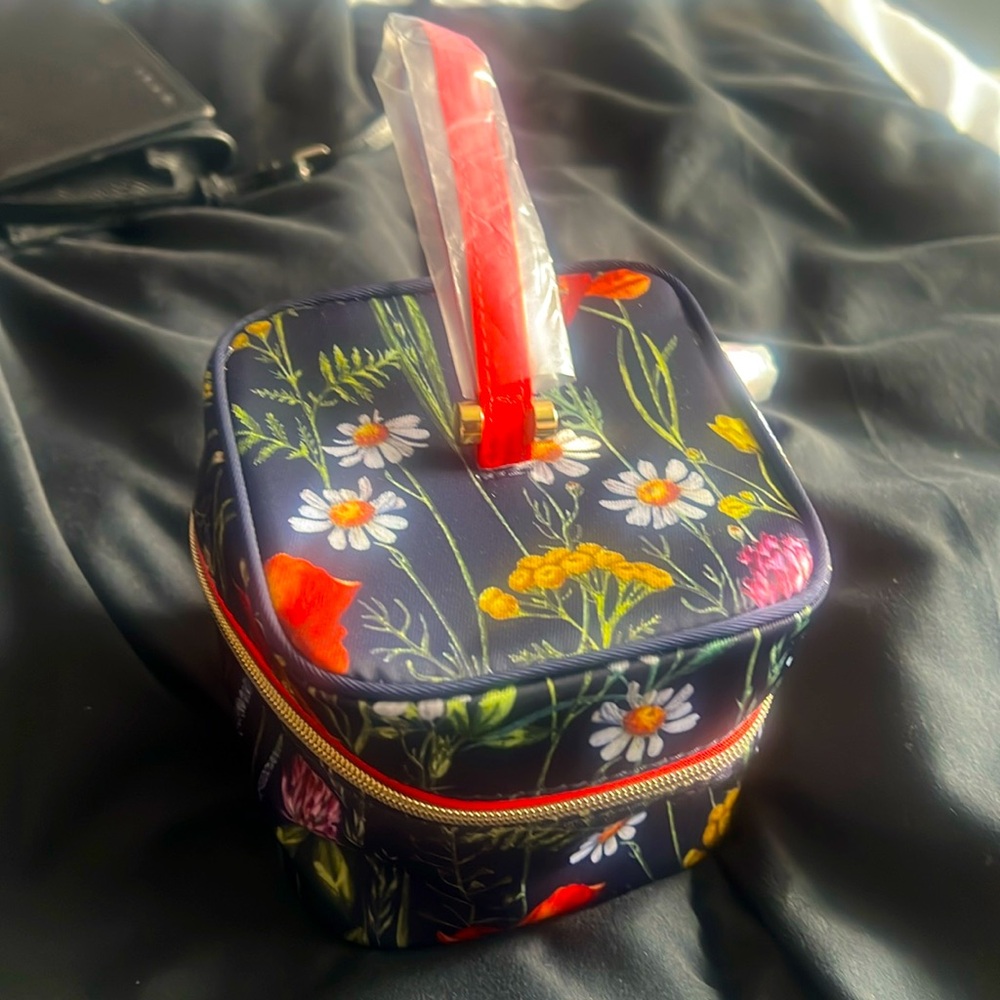 Blue Floral Estée Lauder Makeup bag included with lipstick & Lip balm